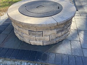 Blockhouse Concreteworks fire pit surround with a Zentro smoke-less insert